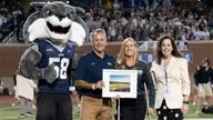 Dave and Kristine Mitchell '91 honored as Donors of the Game