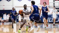 Emuobor's Double-Double Leads UNH Past Stonehill, 59-58