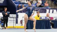 Reade's Floor Triumph Helps Wildcats Take Third Place at Temple's Five-Team Meet