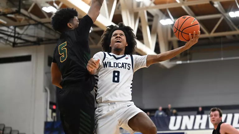 Robinson Nets 22 Points in 80-61 Loss to UVM