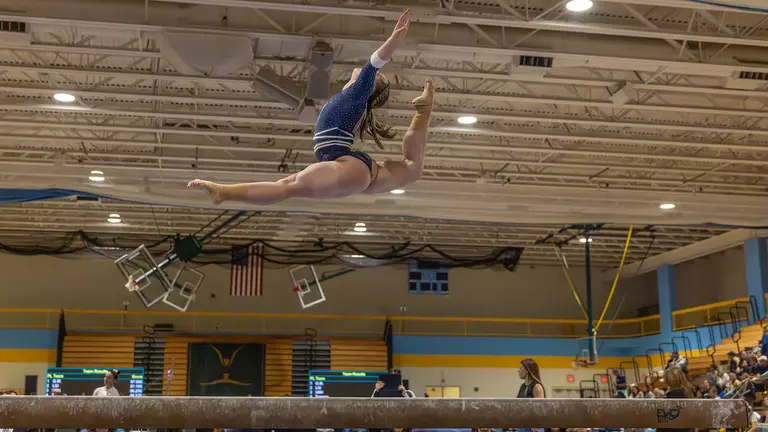 Harvey Takes First on Beam, Wildcats Place Third at EAGL Championship