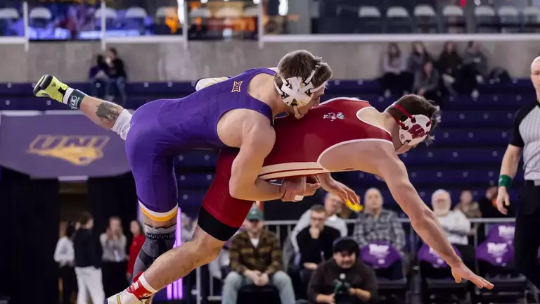 UNI wrestling rallies for senior day win over Wisconsin Image
