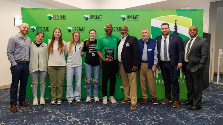 A Team Assist: Women's Basketball Wins Community Engagement Award