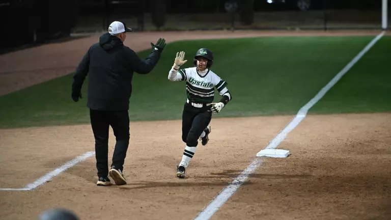 Taliyah Thomas after a solo shot HR