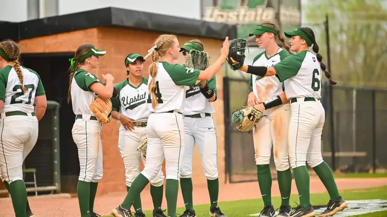 Team huddle with Upstate Softball
