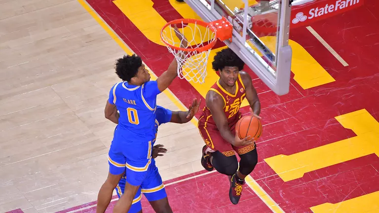 USC Trojans Basketball guard Ethan Anderson lays up vs. UCLA Bruins