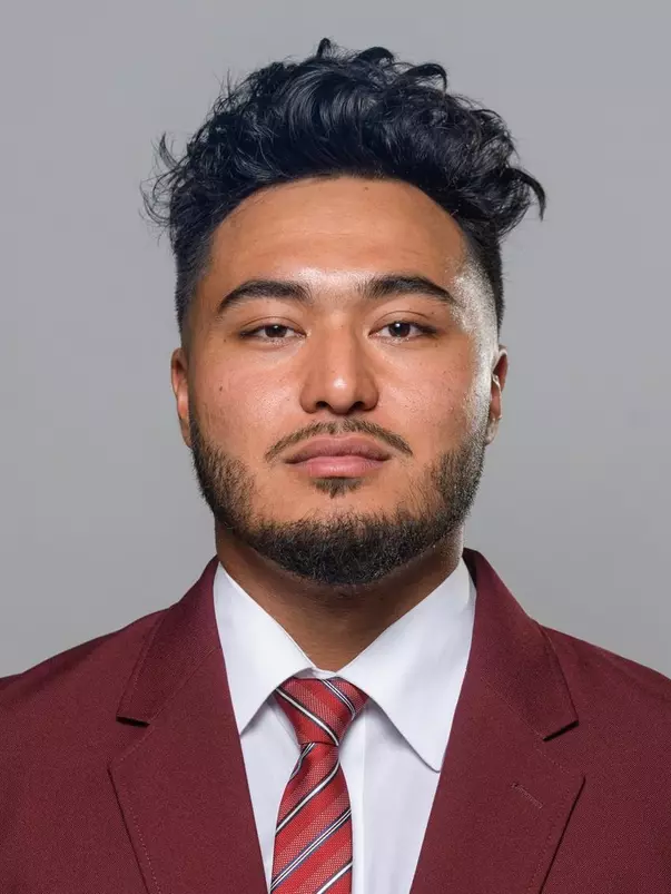Sinjun Astani headshot