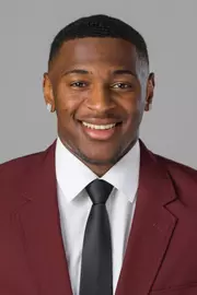 Christian Rolland-Wallace headshot