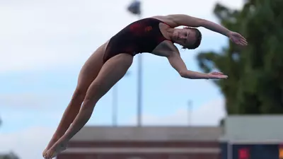 Kate Miller dives sideways off the top of ten meter