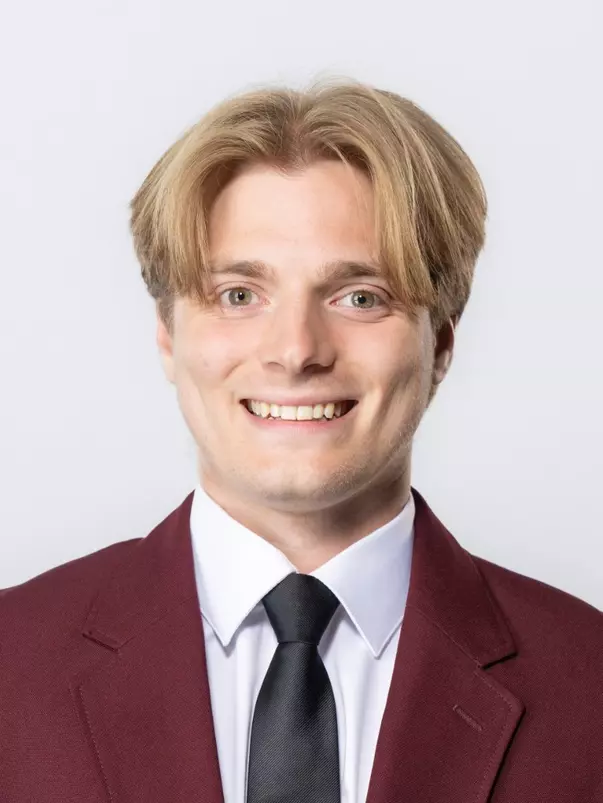 2025 Headshot of Conor McQuinstin