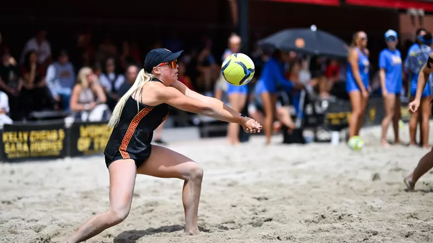 Ashley Pater digs a ball up against UCLA