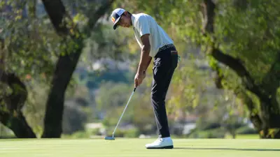 Raghav Gulati putts at the Southwestern Invitational