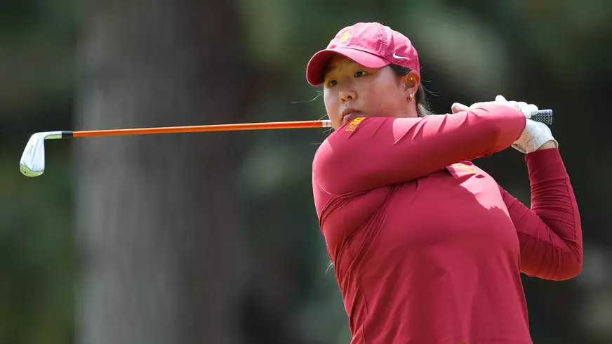 Catherine Park swings an iron at the Big Ten Championships