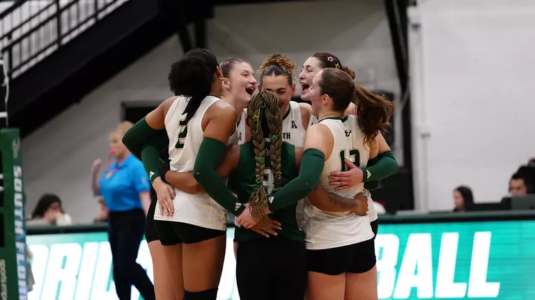 Volleyball in-game huddle during Charlotte