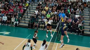 Laila Ivey with a kill against Michigan