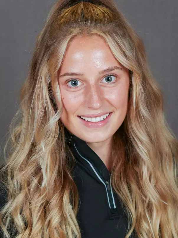 Conner_Martina_XCTF_Headshots_FG21_1_Cropped_.jpg