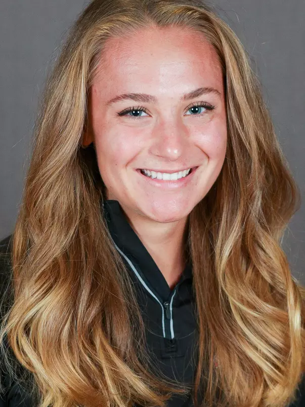 Rusovick_Claire_XCTF_Headshots_FG21_1_Cropped_.jpg