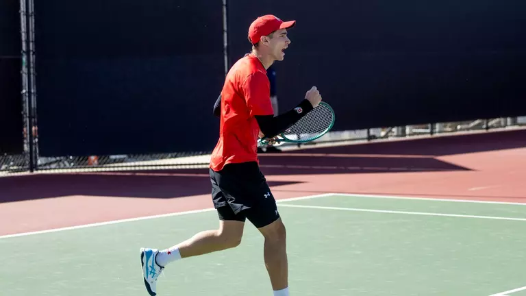 Ute's tennis player Dante Teramo celebrating
