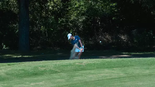 Womens Golfer Swinging