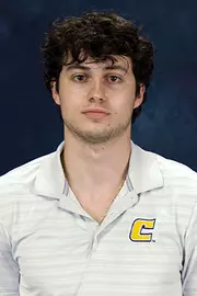 Head shot of basketball guard Alex Tostado.
