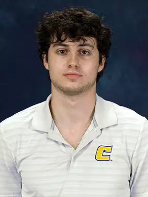 Head shot of basketball guard Alex Tostado.