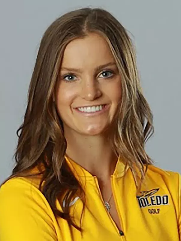 The Women's Golf Team Poses for their action and studio portraits for university marketing in Fetterman Gym.