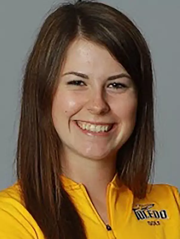 The Women's Golf Team Poses for their action and studio portraits for university marketing in Fetterman Gym.