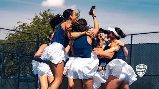 Women's Tennis Celebration after defeating UMass