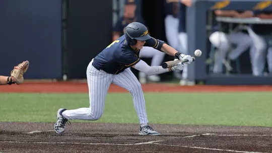 Ryan Sudbrook lays down a bunt