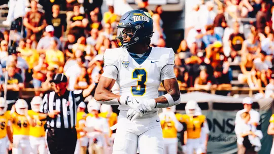 Andre Fuller standing before a play