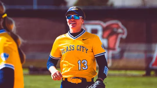 Payton Pudlowski smiling on the Bowling Green softball field