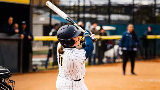 Audrey Miller swings bat
