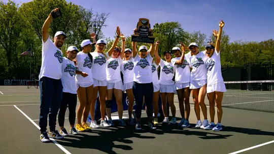 Women's Tennis Celebration with the MAC Championship trophy