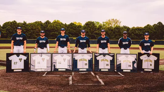 Seven Toledo baseball seniors pose for a photo
