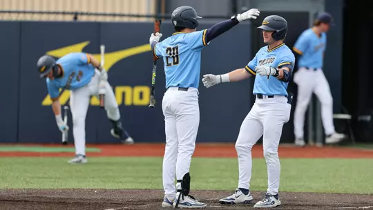 Cole Cahill and Cade Baker celebrate a home run