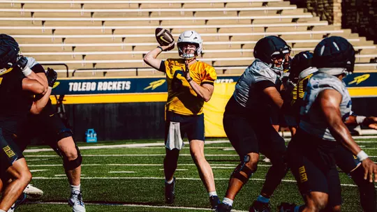 John Alan Richter throws a pass during fall camp