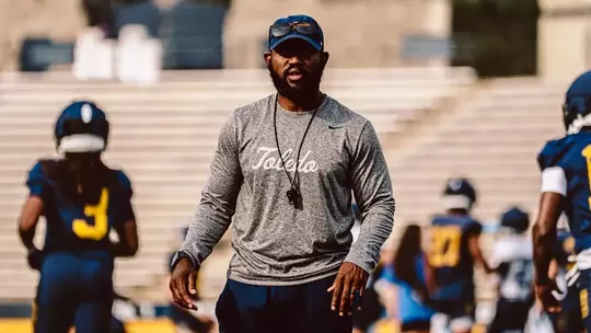 Toledo runing backs coach Fred Jones coaching during practice