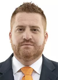 KNOXVILLE, TN - March 10, 2021 - Offensive Coordinator/Tight Ends Coach Alex Golesh of the Tennessee Volunteers headshot taken in Knoxville, TN. Photo By Andrew Ferguson/Tennessee Athletics