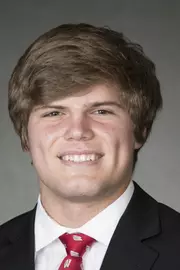 Devin Bahr headshot in suit