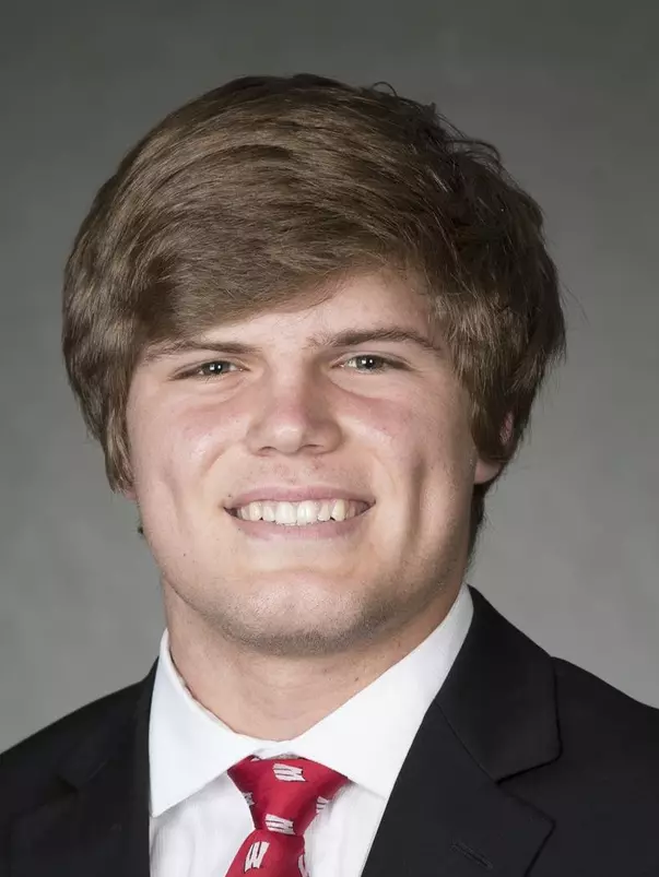 Devin Bahr headshot in suit