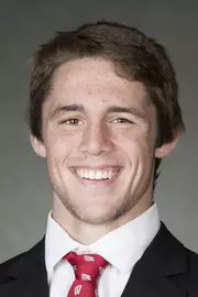 Garrett Model headshot in suit