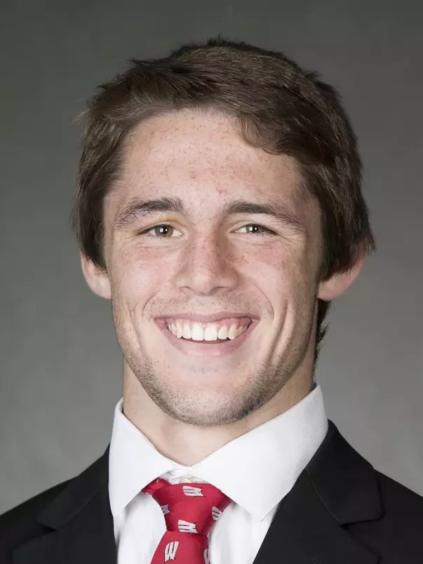 Garrett Model headshot in suit