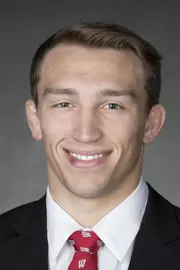 Andrew Crone headshot in suit