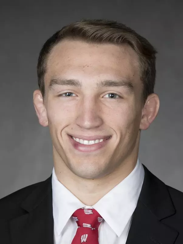 Andrew Crone headshot in suit