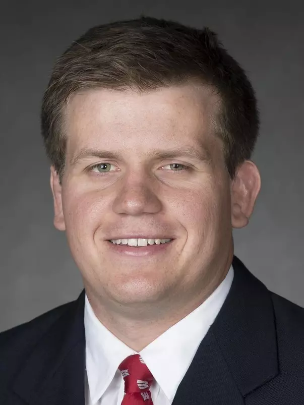 Eric Peissig headshot in suit