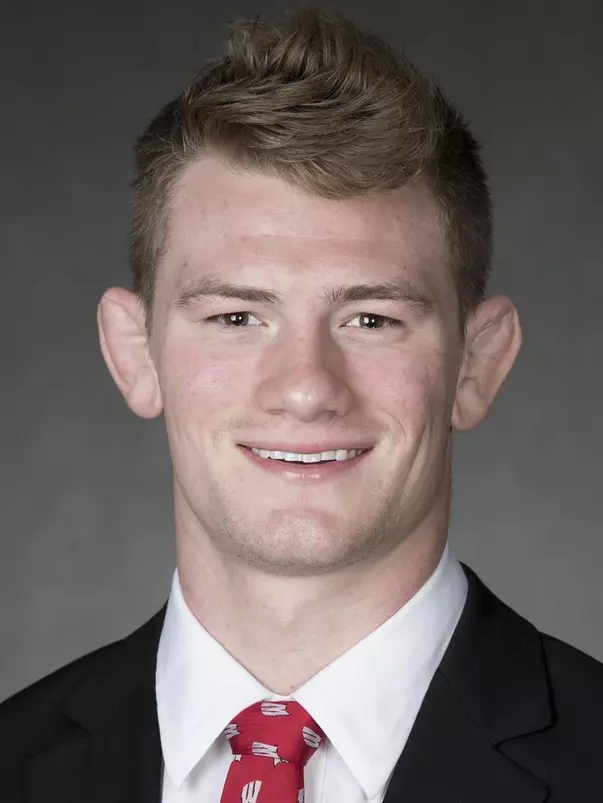 Jared Scharenbrock headshot in suit