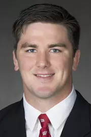 Jake Stilling headshot in suit