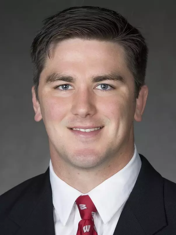 Jake Stilling headshot in suit