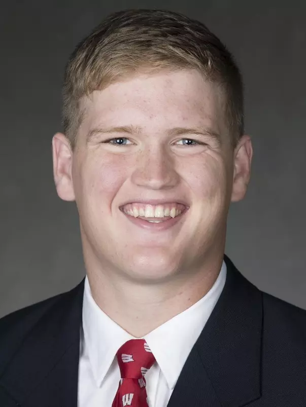 Ben Stone headshot in suit