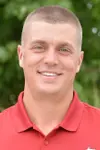 Assistant men's golf coach Chris Gilbert